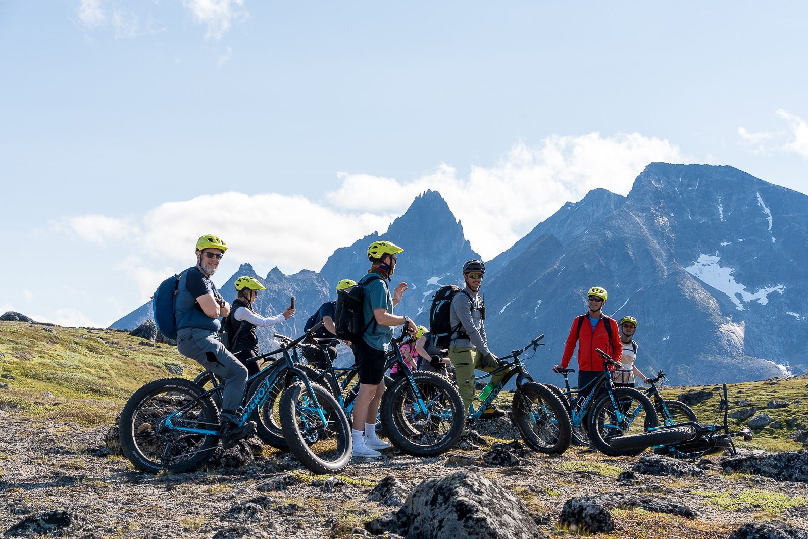 Guests enjoy helicopter-supported mountain biking in South Greeland.