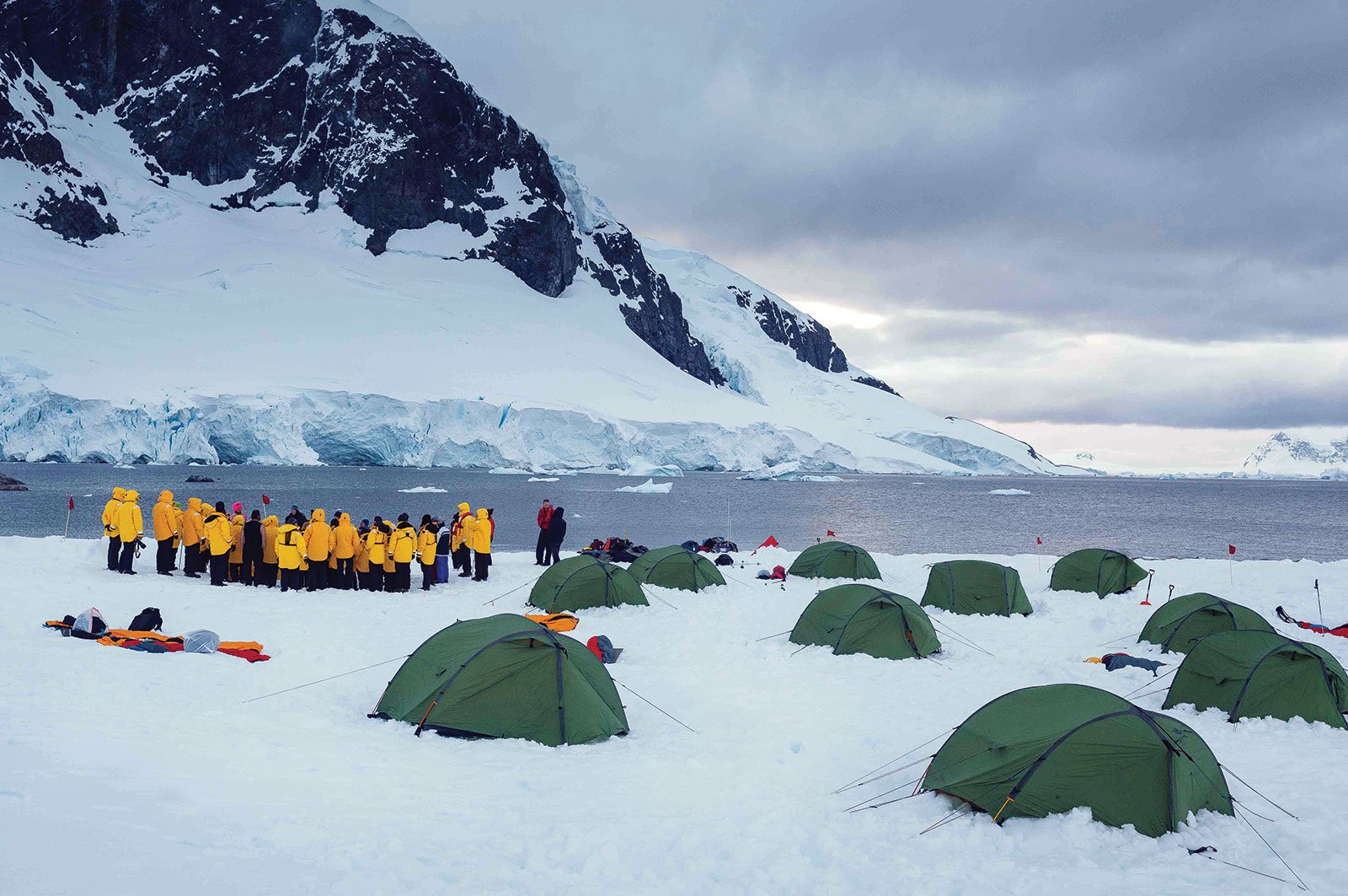 Campers get ready for a night sleeping under the Antarctic sky.