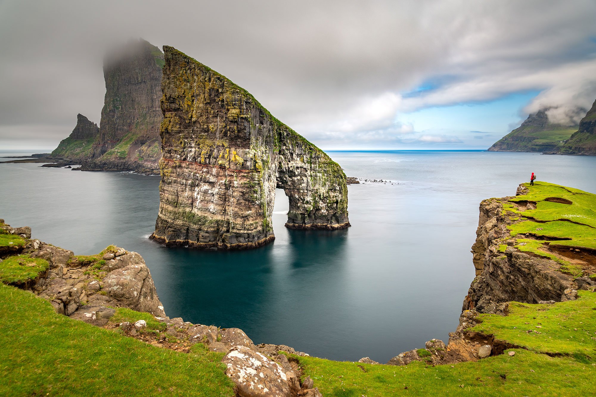 Landscape of the Faroe Islands with dramatic cliffs and see scenes. 