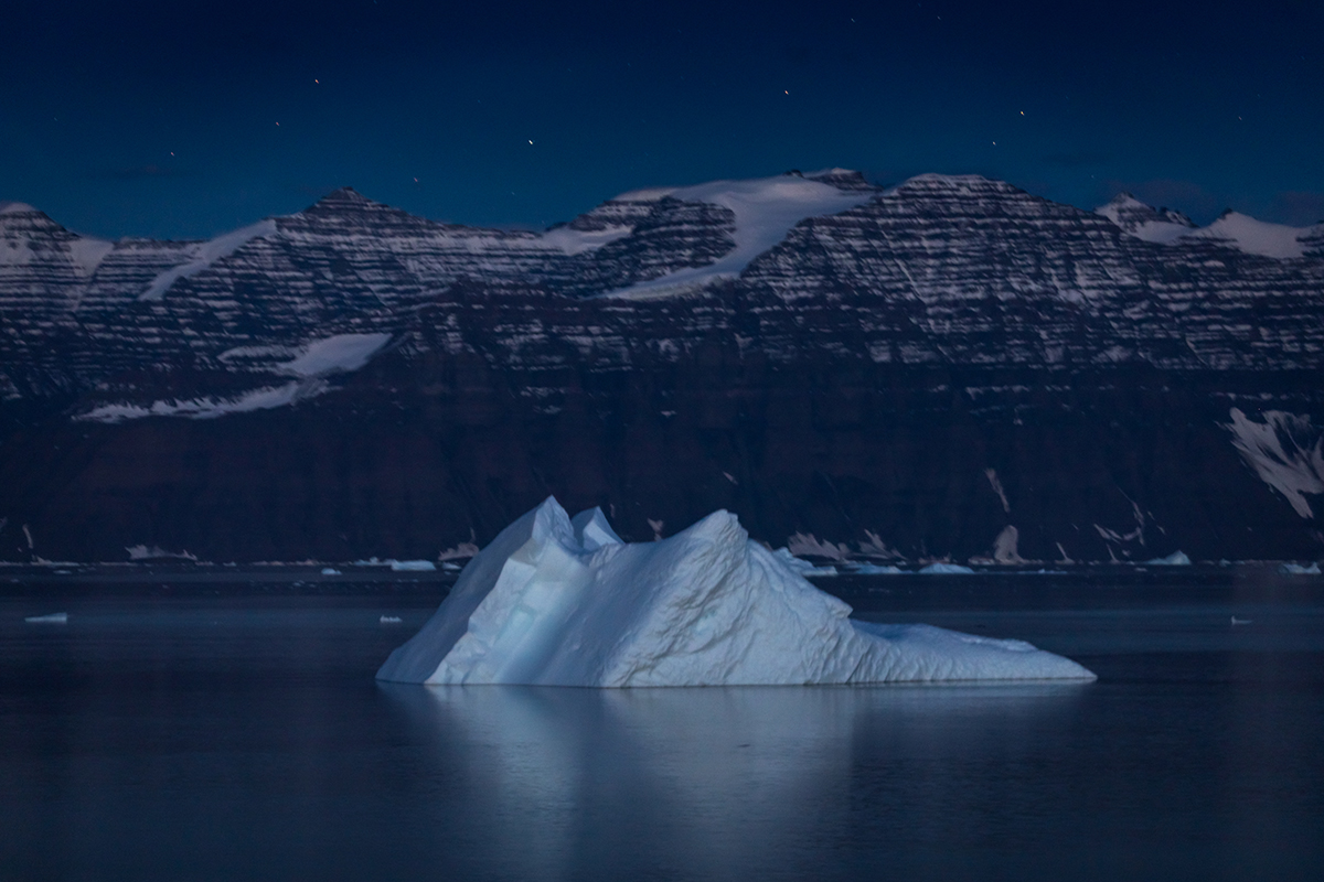 Long exposure photo of iceberg during evening hours in Greenland. Photo by Acacia Johnson