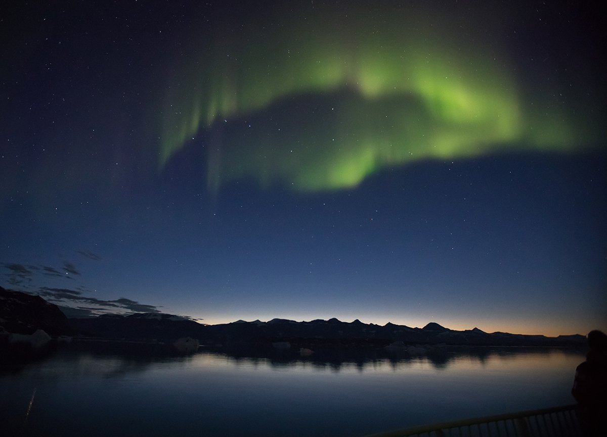 A brilliant arc of aurora near Danmark Island, East Greenland.Photo: Acacia Johnson