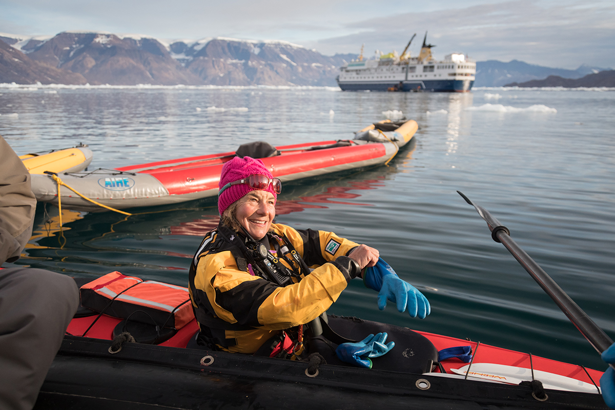 Quark Expeditions guide Jane Whitney prepares to lead the Paddle Excursion Program through a bay of glacier ice.Photo by Acacia Johnson