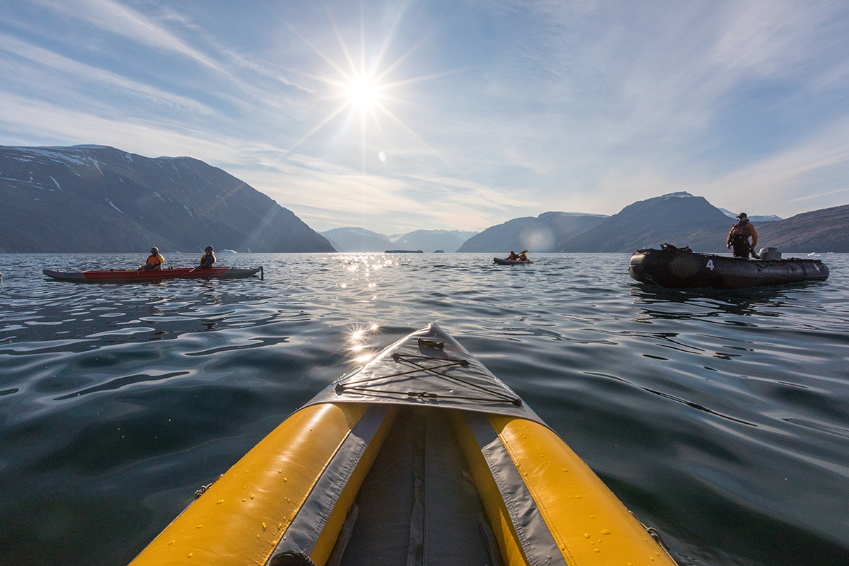 Perspective from the waters as paddlers enjoy a sunny excursion. Photo by Acacia Johnson