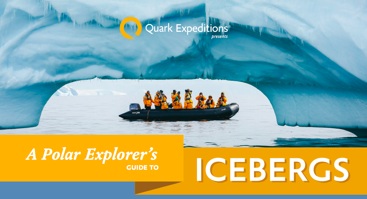 Quark passengers are pictured below a giant iceberg in Antarctica in this image from A Polar Explorer&apos;s Guide to Icebergs.