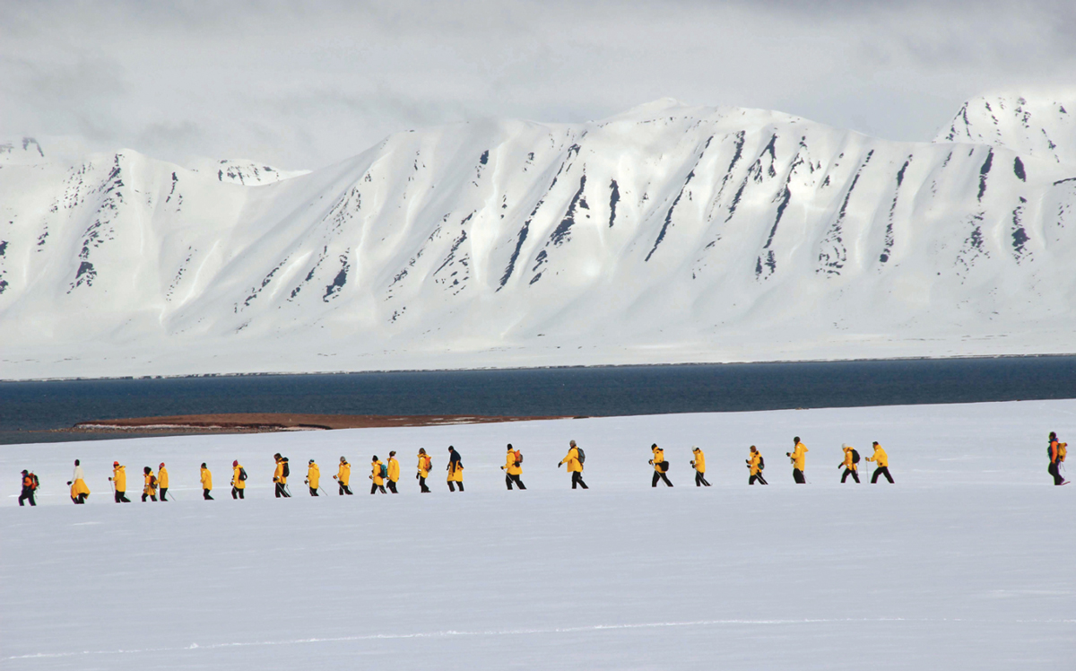 Quark passengers snowshoe the pristine Spitsbergen tundra