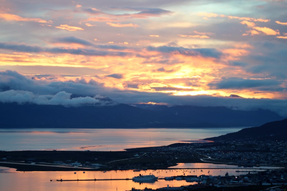 A fiery sunset lights up the port of Ushuaia just after the Ocean Diamond’s departure on December 21 2016, as a brand new expedition group heads into the Drake Passage.