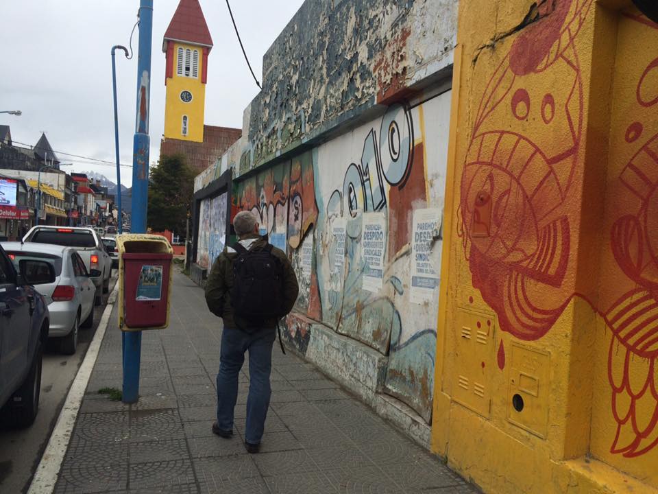 Exploring Ushuaia pre-embarkation; surveying the colorful street art on San Martin. 