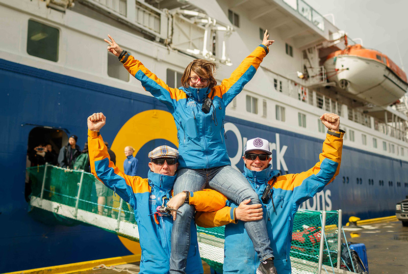 Quark Expeditions Team members welcome guests aboard
