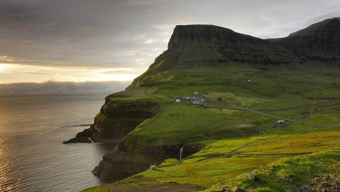 You’ll visit Tórshavn and explore the countryside of the Faroe Islands on your repositioning cruise from Scotland to Svalbard.