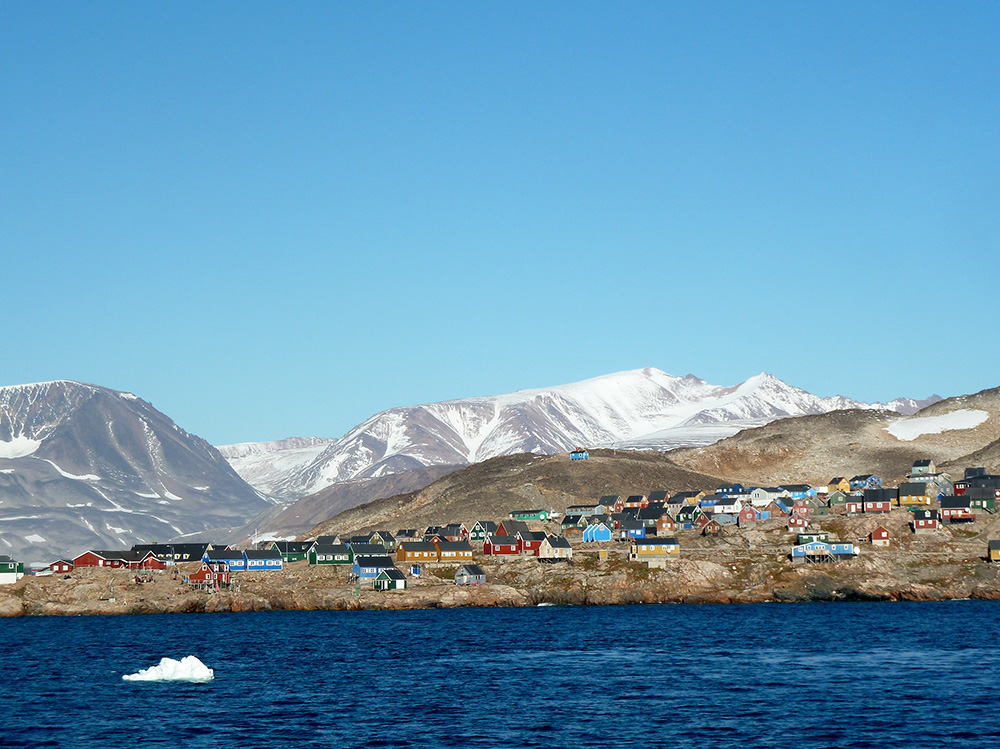 The tiny, colorful Greenlandic village of Ittoqqortoormiit beckons.