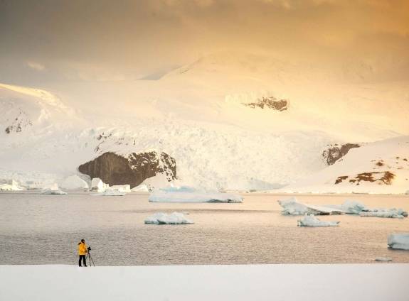 Passenger taking a photo of Antarctic Landscape