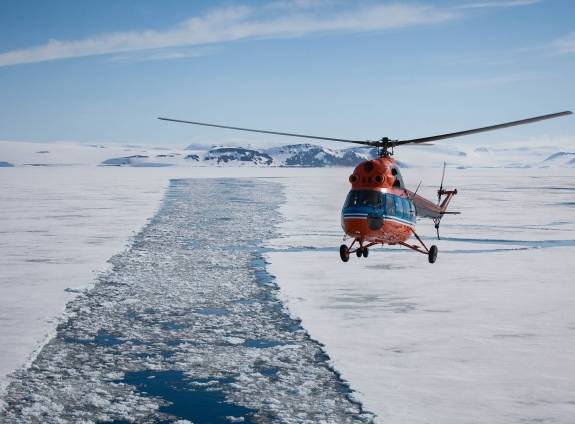 Helicopter in Arctic Landscape
